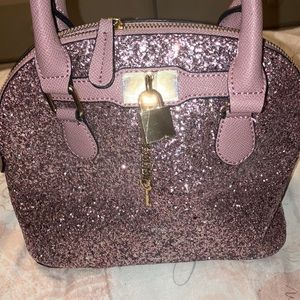 Also glitter purse in good condition
